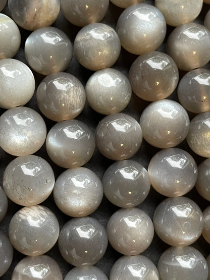 AAA Natural gray moonstone bead. 5mm, 6mm, 7mm, 8mm, 9mm, 10mm round stone bead. Beautiful natural rainbow flash on. Full strand 15.5”