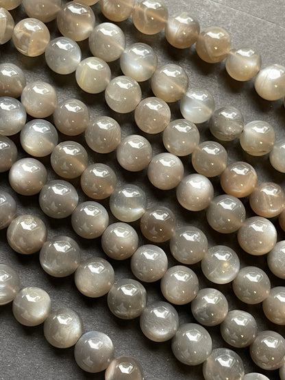AAA Natural gray moonstone bead. 5mm, 6mm, 7mm, 8mm, 9mm, 10mm round stone bead. Beautiful natural rainbow flash on. Full strand 15.5”