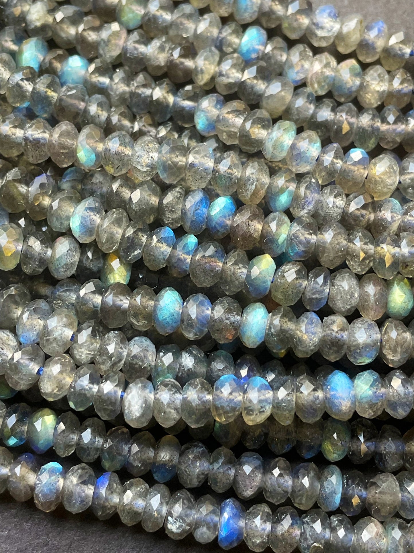 AA Natural blue flash labradorite stone bead . Faceted 3x4mm Rondelle Shape bead. Gorgeous gray color with beautiful blue flash full strand