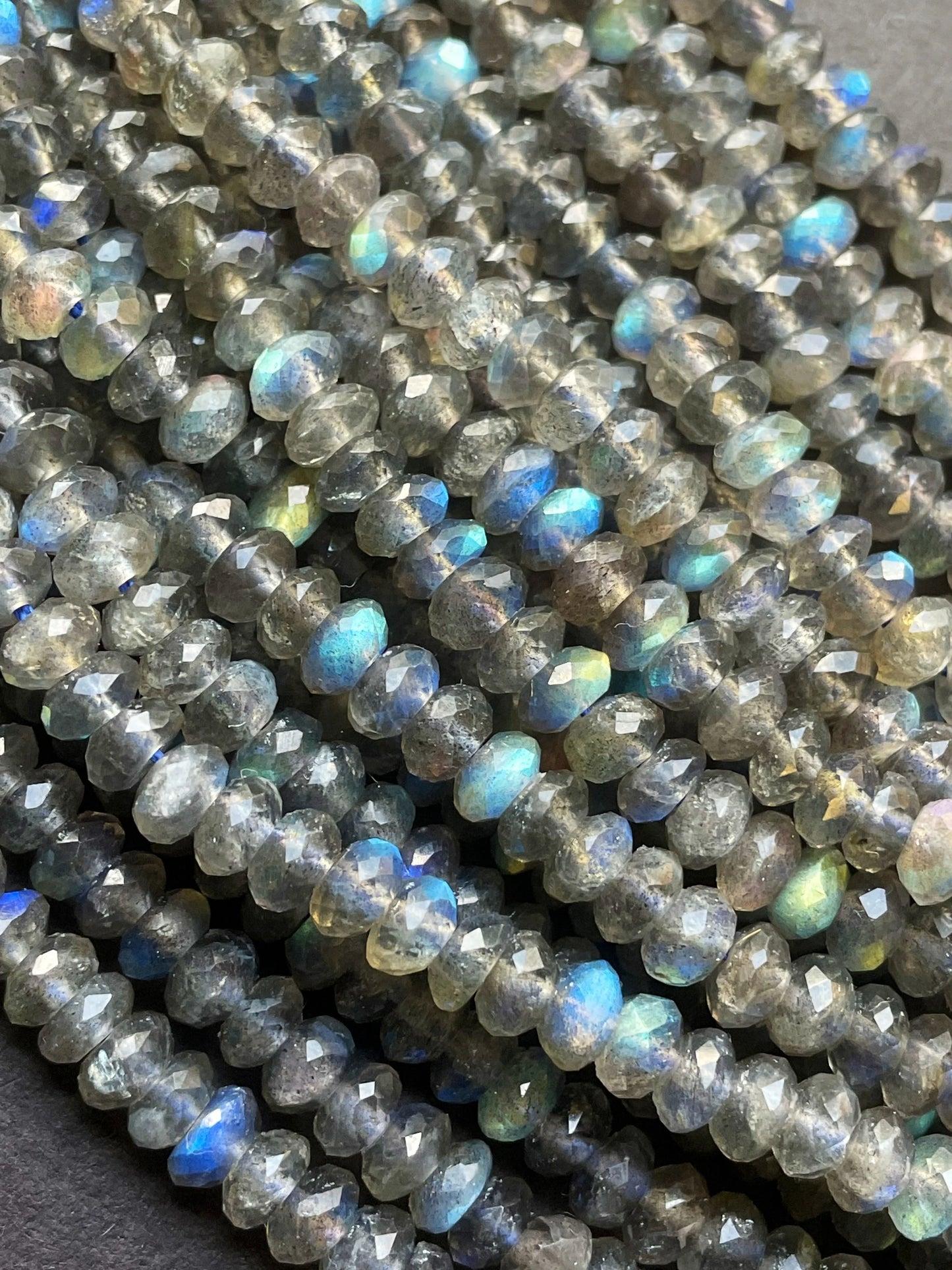 AA Natural blue flash labradorite stone bead . Faceted 3x4mm Rondelle Shape bead. Gorgeous gray color with beautiful blue flash full strand