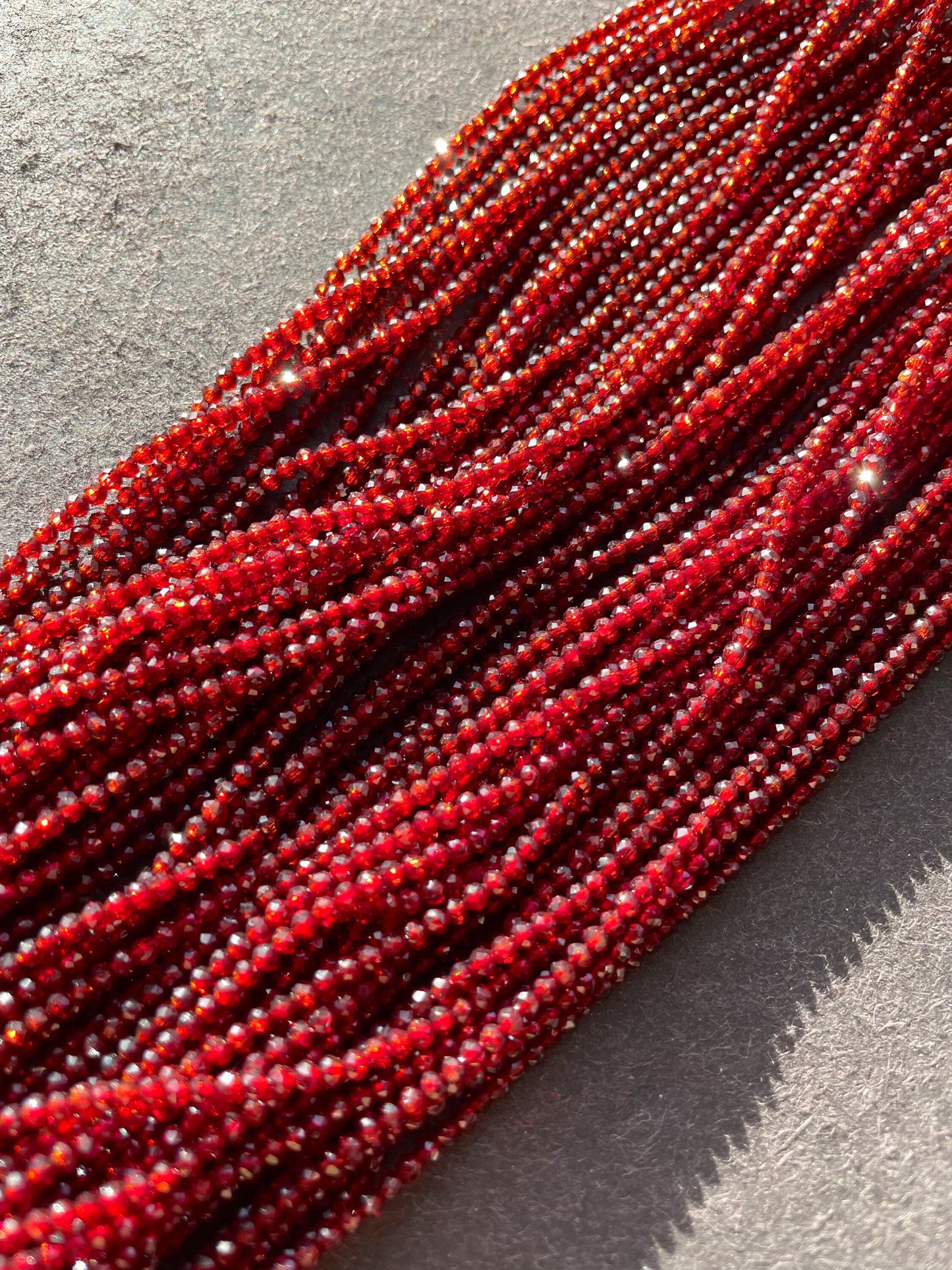 Ruby Red Crystal Beads: 2mm Round Strand (15.5")