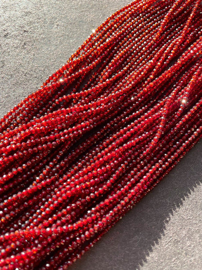 Ruby Red Crystal Beads: 2mm Round Strand (15.5")