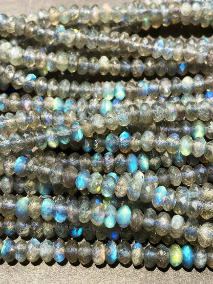 AA Natural blue flash labradorite stone bead . Faceted 3x4mm Rondelle Shape bead. Gorgeous gray color with beautiful blue flash full strand