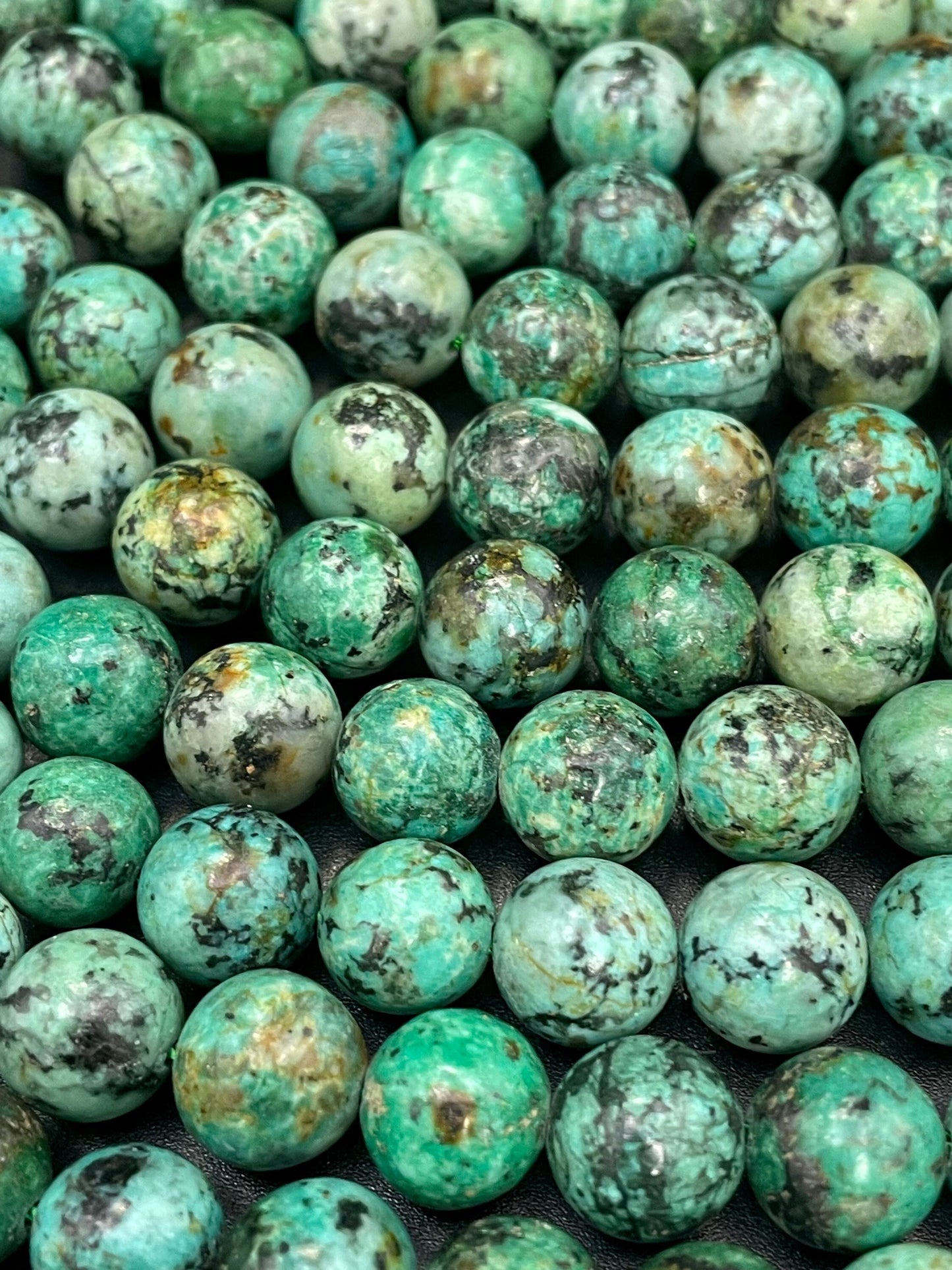 AAA Natural African turquoise stone bead. 6mm 8mm 10mm round bead . Gorgeous natural turquoise green blue with black points Gemstone,