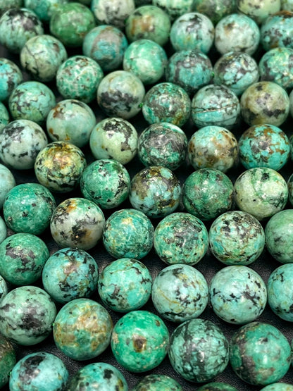 AAA Natural African turquoise stone bead. 6mm 8mm 10mm round bead . Gorgeous natural turquoise green blue with black points Gemstone,