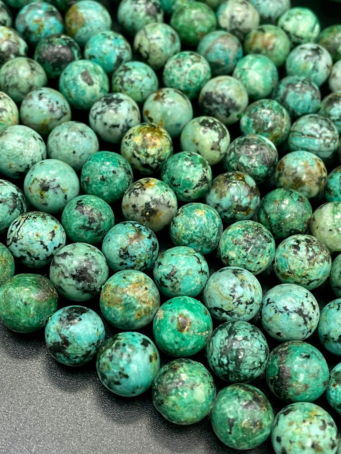 AAA Natural African turquoise stone bead. 6mm 8mm 10mm round bead . Gorgeous natural turquoise green blue with black points Gemstone,