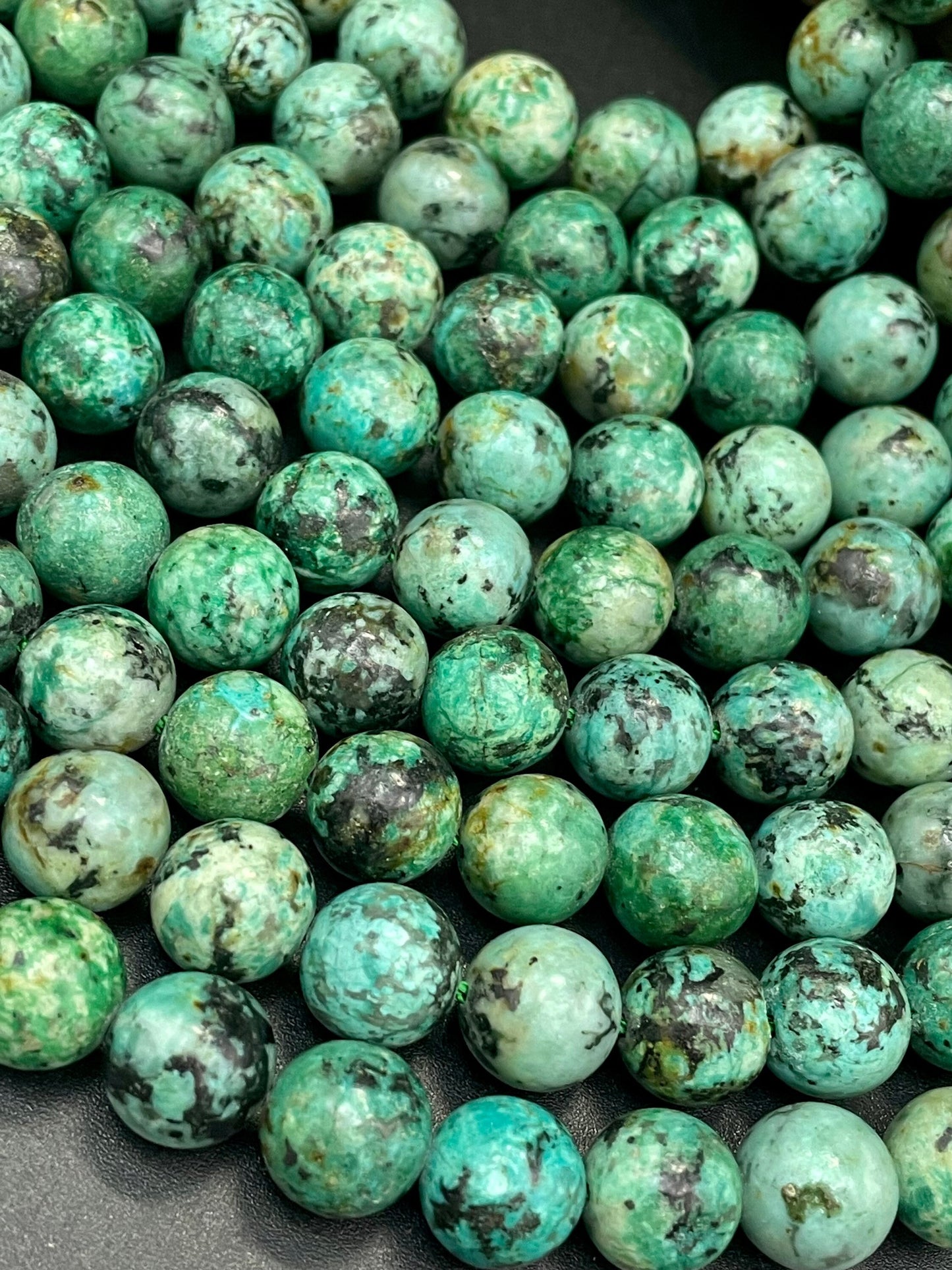 AAA Natural African turquoise stone bead. 6mm 8mm 10mm round bead . Gorgeous natural turquoise green blue with black points Gemstone,