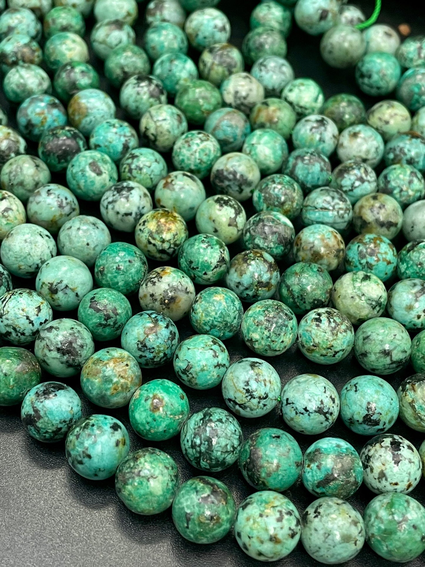 AAA Natural African turquoise stone bead. 6mm 8mm 10mm round bead . Gorgeous natural turquoise green blue with black points Gemstone,
