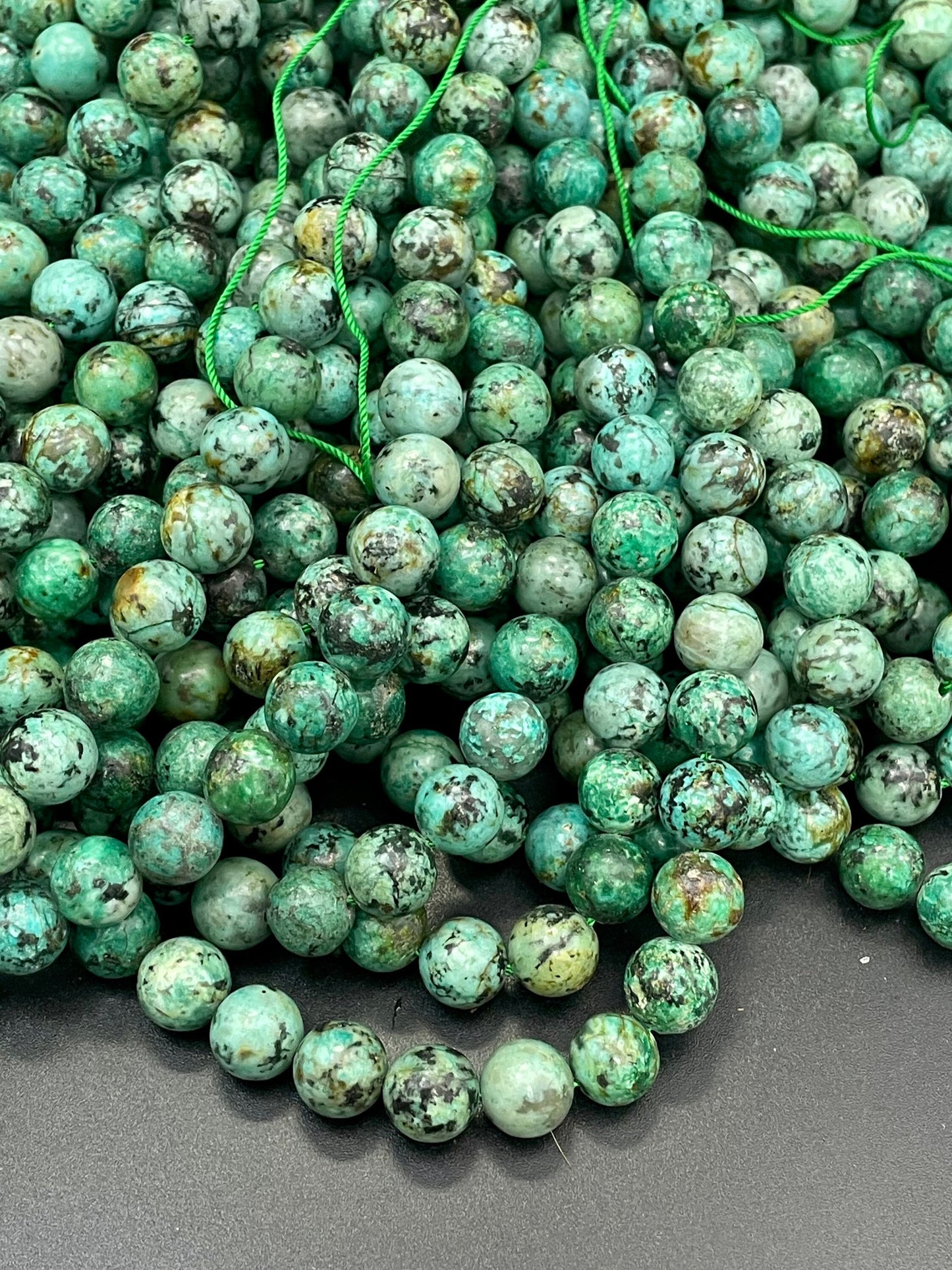 AAA Natural African turquoise stone bead. 6mm 8mm 10mm round bead . Gorgeous natural turquoise green blue with black points Gemstone,