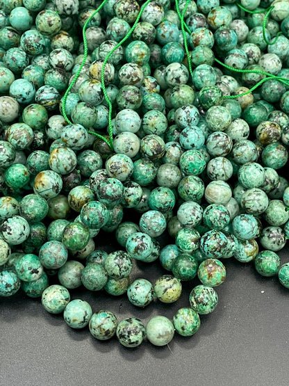 AAA Natural African turquoise stone bead. 6mm 8mm 10mm round bead . Gorgeous natural turquoise green blue with black points Gemstone,