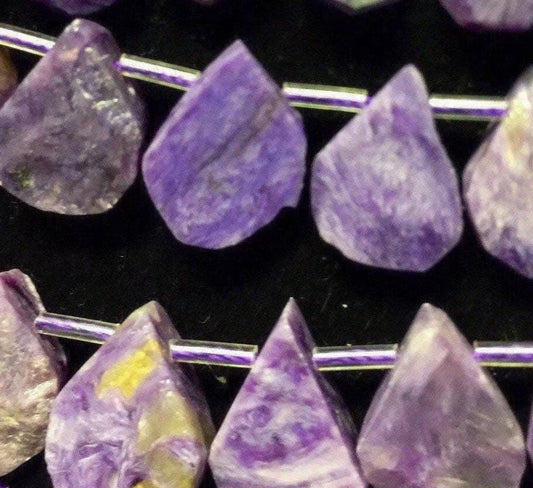 Natural Charoite beads teardrop shape 11x15mm natural Charoite gemstone color . Guaranteed 100% natural Charlotte bead . Full strand 15.5”