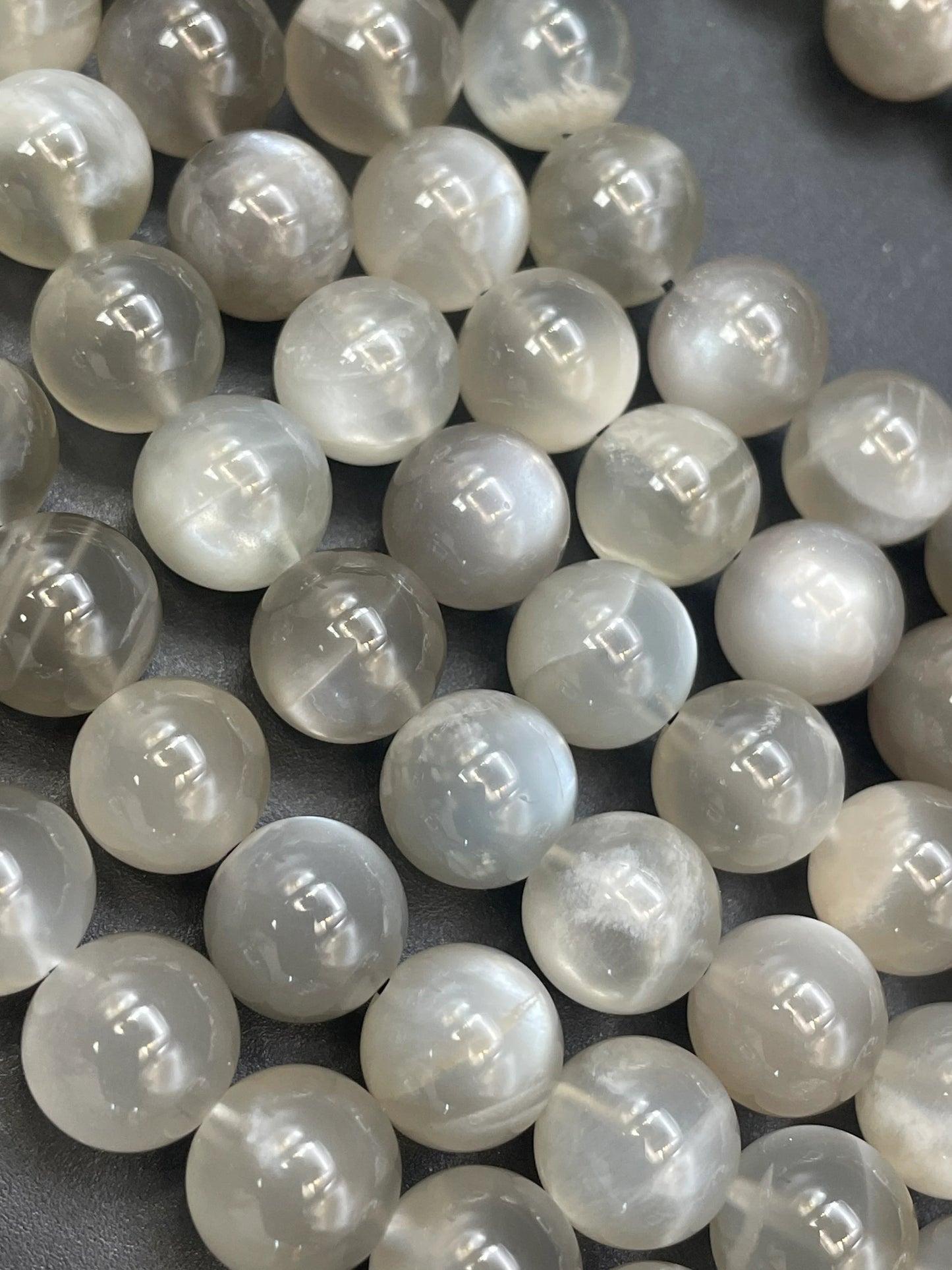 AAA super nice gray rainbow moonstone bead. 4mm 6mm 8mm 10mm round bead. Gorgeous natural gray color with rainbow flash . High quality bead