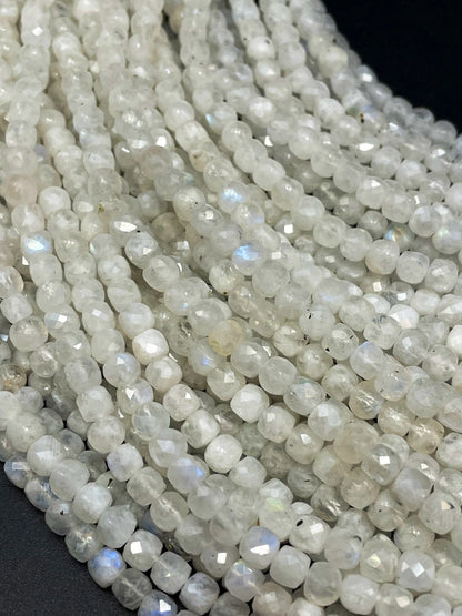 AA natural  moonstone bead . Faceted 5mm cube shape bead. Beautiful natural white moonstone with blue flash on . High quality gemstone bead