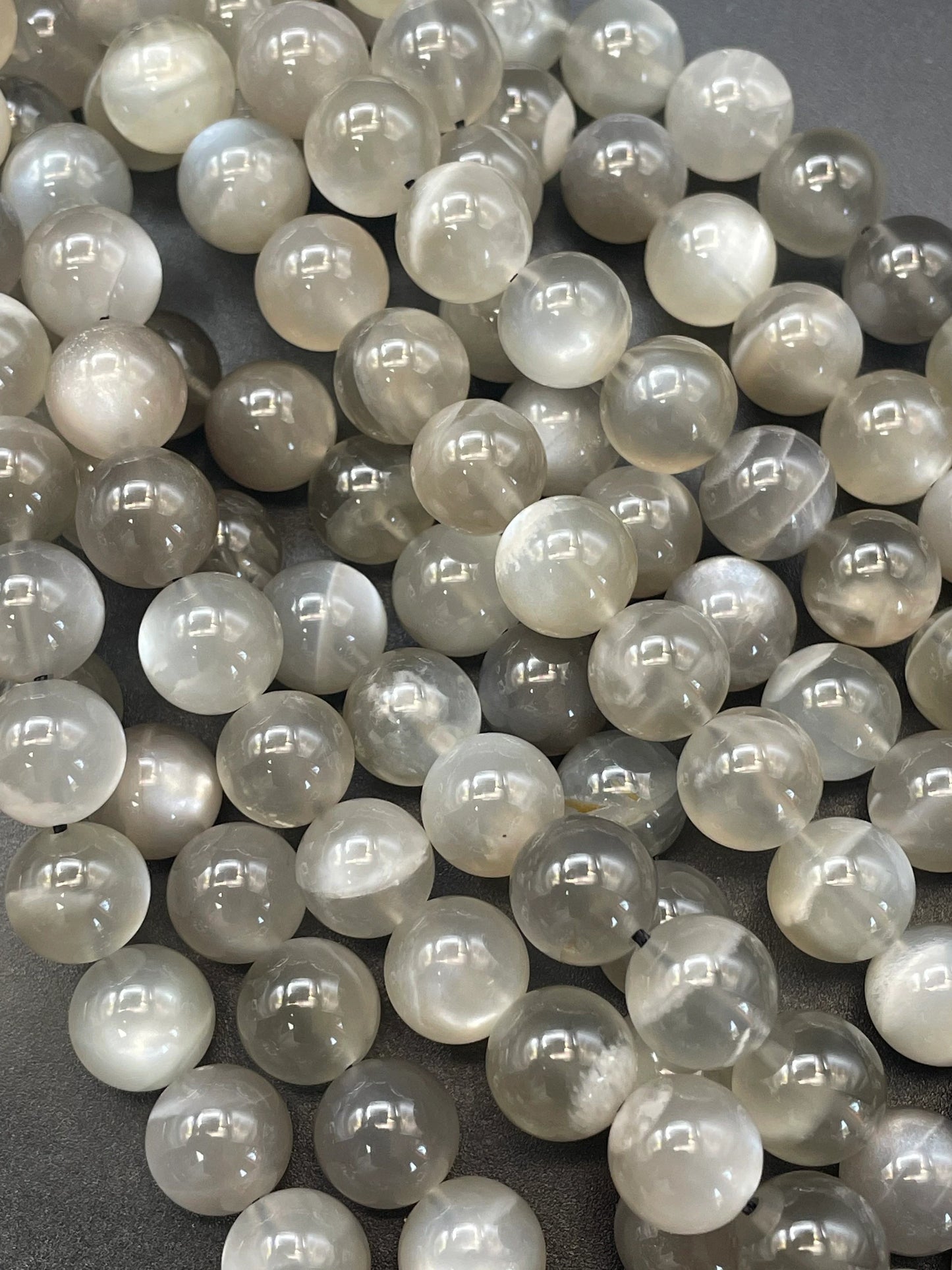 AAA super nice gray rainbow moonstone bead. 4mm 6mm 8mm 10mm round bead. Gorgeous natural gray color with rainbow flash . High quality bead
