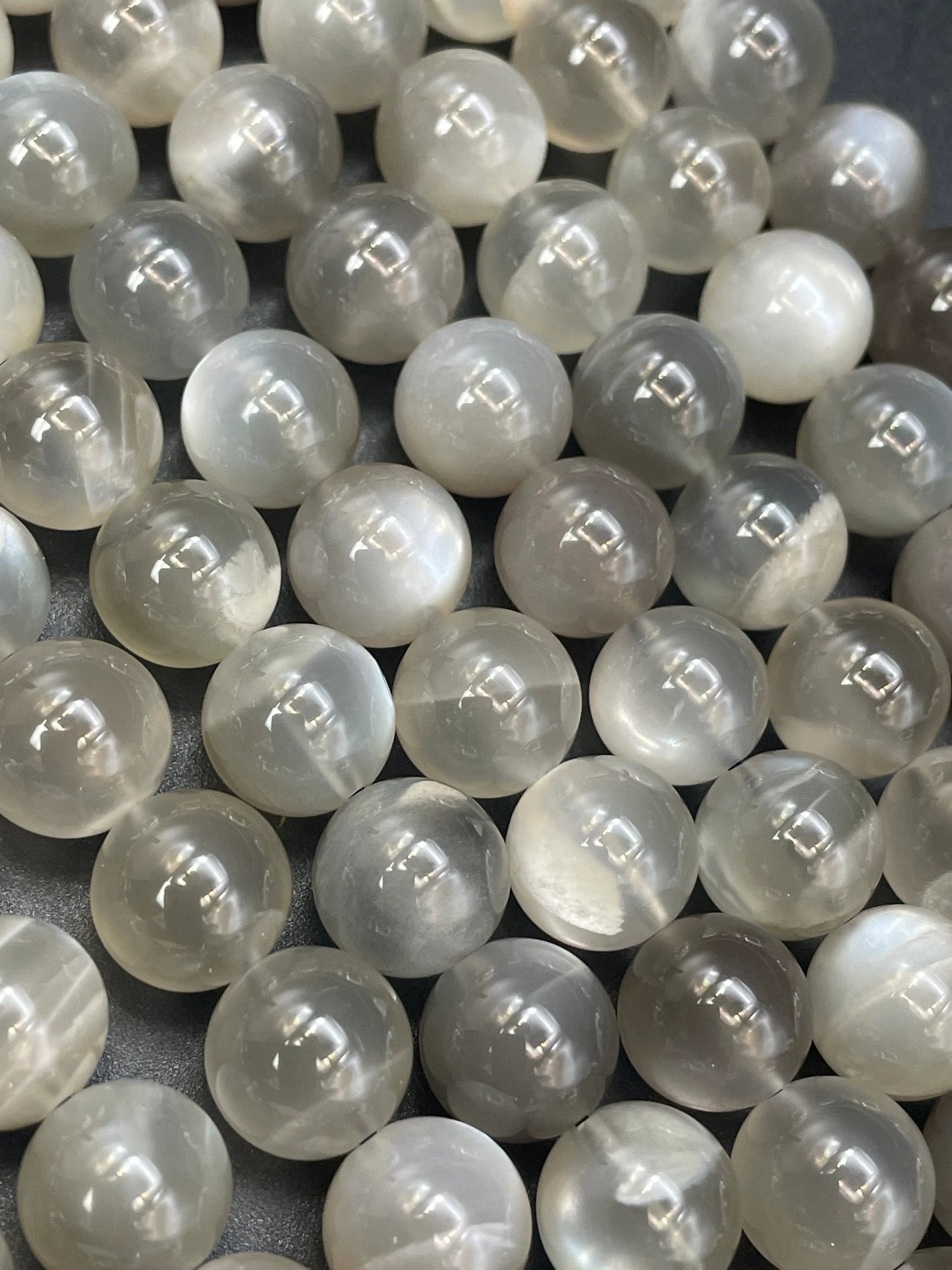 AAA super nice gray rainbow moonstone bead. 4mm 6mm 8mm 10mm round bead. Gorgeous natural gray color with rainbow flash . High quality bead