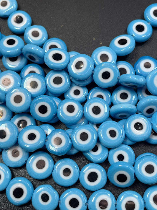 Beautiful Evil eye glass crystal beads . Religious amulet prayer beads . 10mm flat Coin shape Beautiful blue black color. Lucky eye