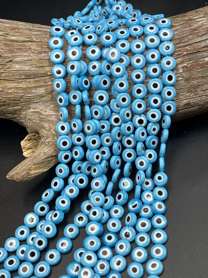 Beautiful Evil eye glass crystal beads . Religious amulet prayer beads . 10mm flat Coin shape Beautiful blue black color. Lucky eye