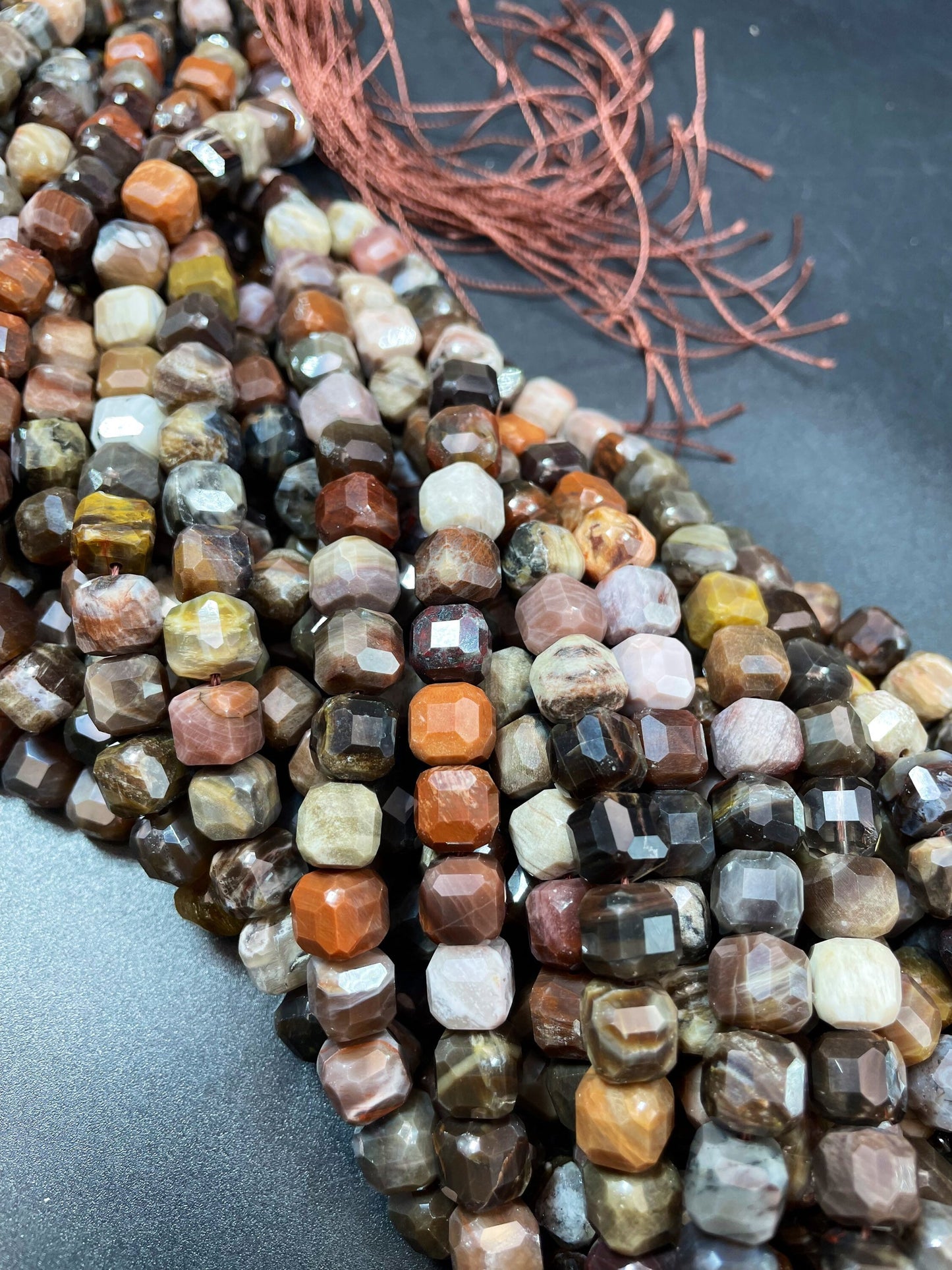 AAA natural Petrified Wood jasper. Faceted 9mm cube shape bead. Gorgeous natural brown orange Gray color. High quality gemstone bead!