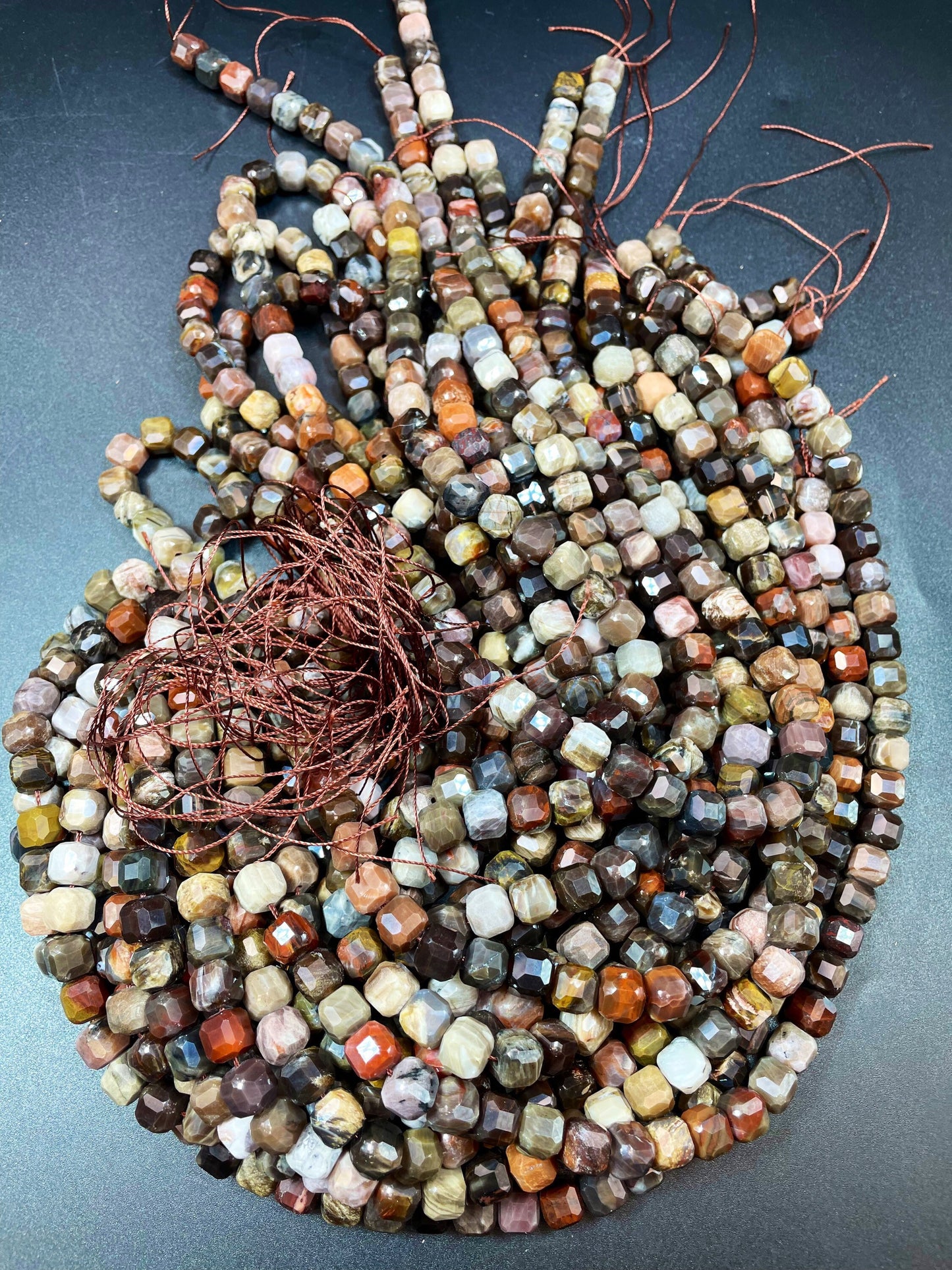 AAA natural Petrified Wood jasper. Faceted 9mm cube shape bead. Gorgeous natural brown orange Gray color. High quality gemstone bead!