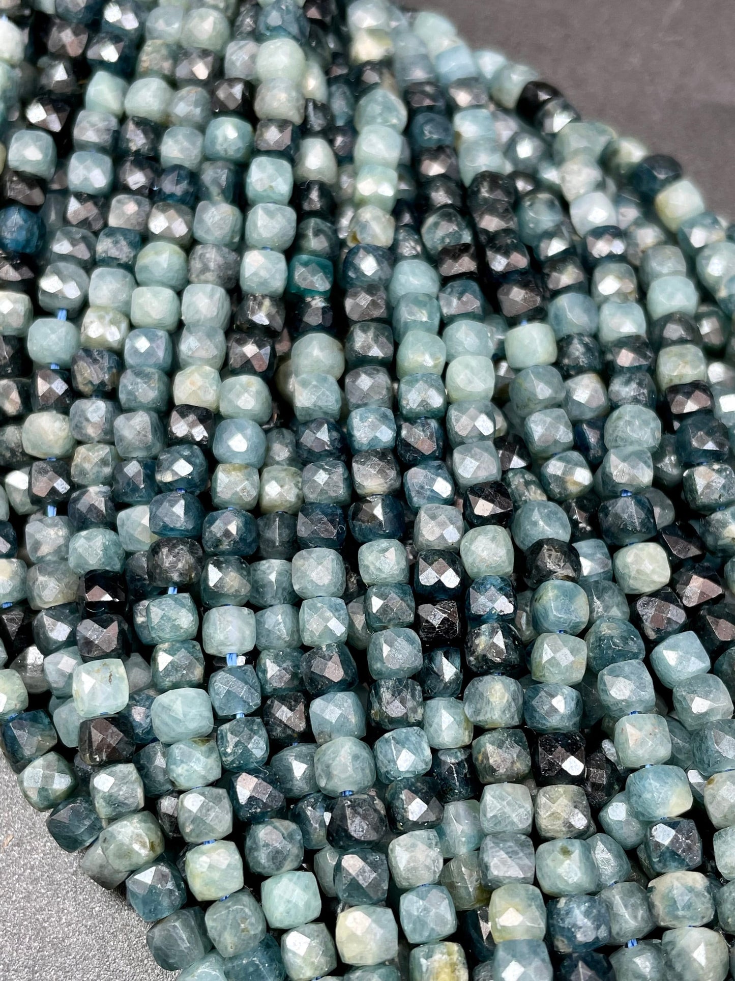 Natural Blue Tourmaline stone bead. Faceted 4mm cube shape bead. Beautiful natural blue black tourmaline gemstone bead. Full strand 15.5”