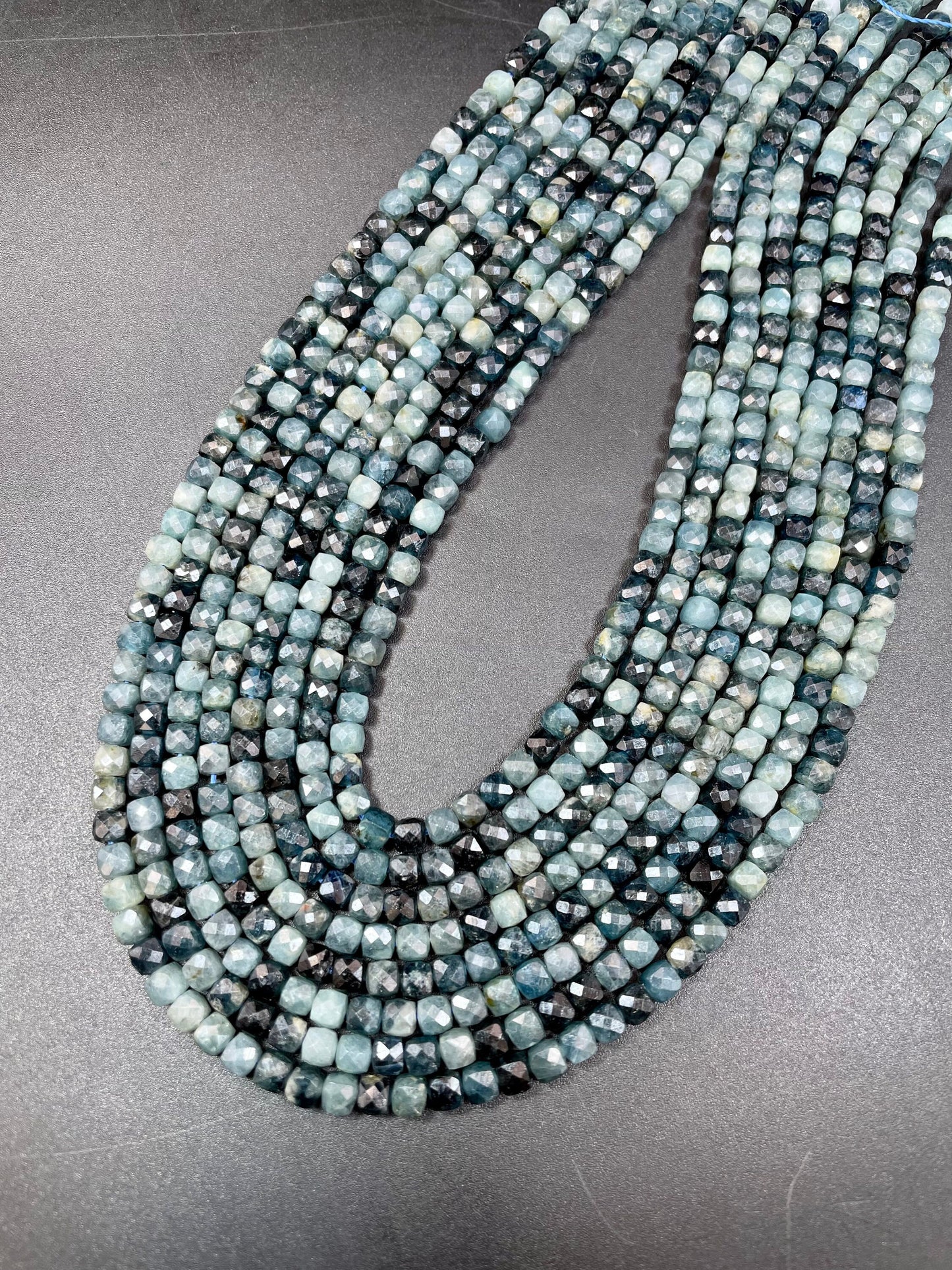 Natural Blue Tourmaline stone bead. Faceted 4mm cube shape bead. Beautiful natural blue black tourmaline gemstone bead. Full strand 15.5”