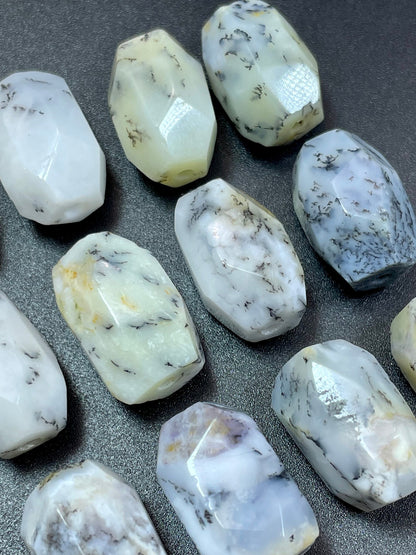 AAA Natural white opal gemstone bead. Faceted 13x19mm barrel shape bead. Beautiful natural white color with gray points. High quality bead!