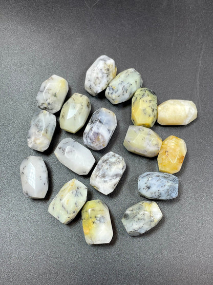 AAA Natural white opal gemstone bead. Faceted 13x19mm barrel shape bead. Beautiful natural white color with gray points. High quality bead!