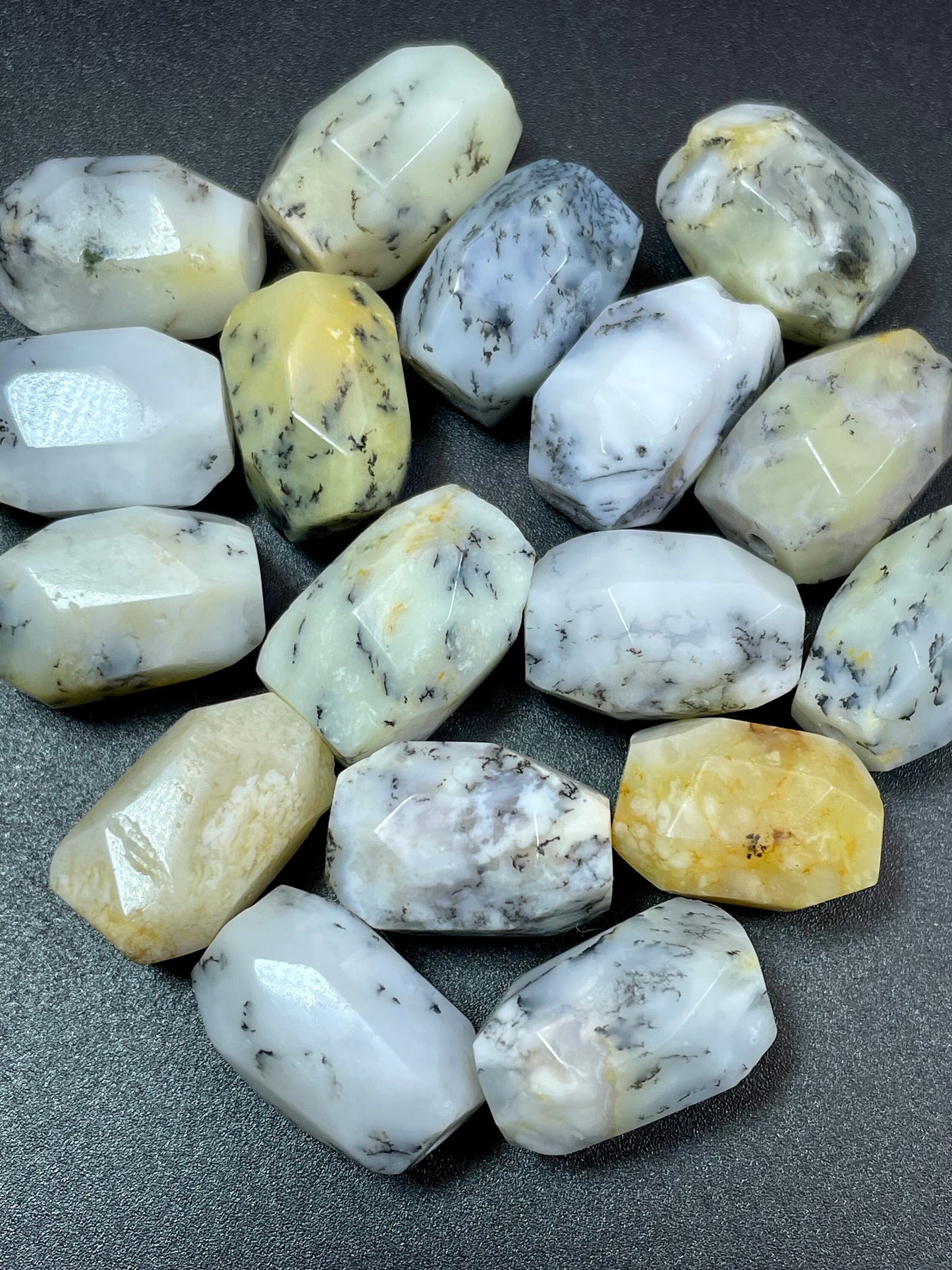 AAA Natural white opal gemstone bead. Faceted 13x19mm barrel shape bead. Beautiful natural white color with gray points. High quality bead!