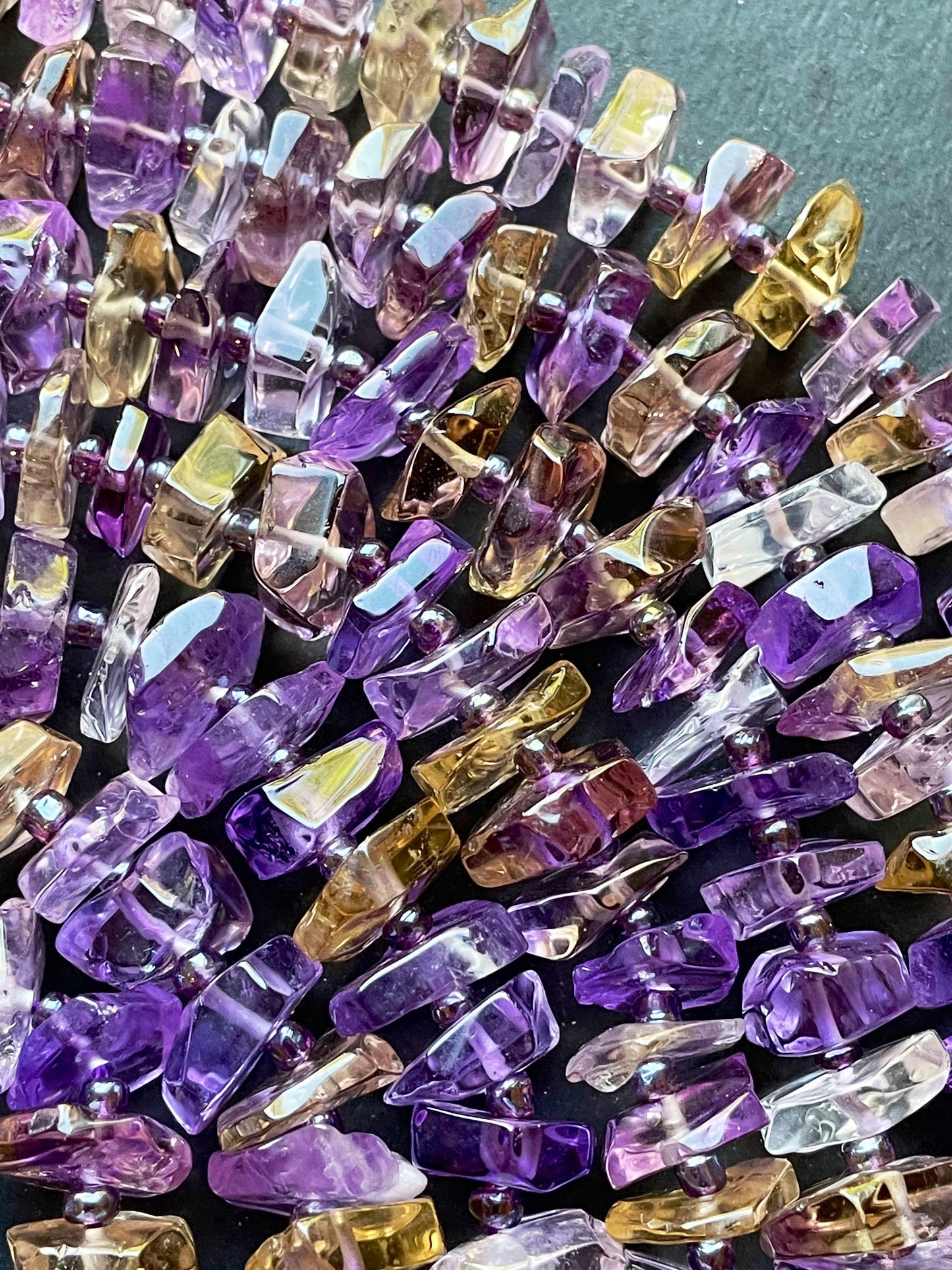 100% Natural Ametrine Gemstone Bead. Faceted 12mm Pinwheel Shape. Beautiful Natural Purple Honey Yellow Color. Super Clear Nice Quality!