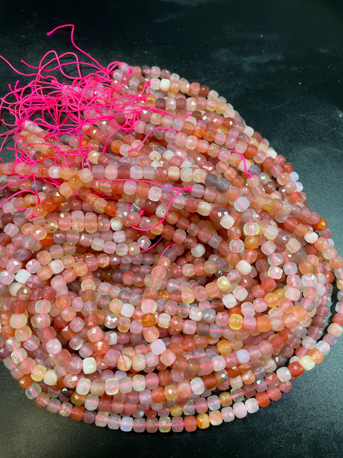 Natural red Botswana gemstone bead. Faceted 5mm cube shape bead. Gorgeous natural orange brown crammy white color. Full strand 15.5”