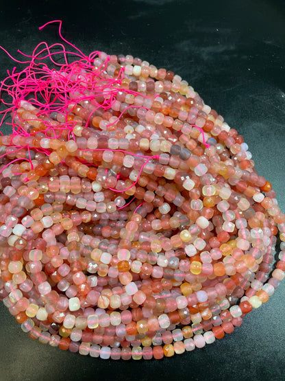 Natural red Botswana gemstone bead. Faceted 5mm cube shape bead. Gorgeous natural orange brown crammy white color. Full strand 15.5”