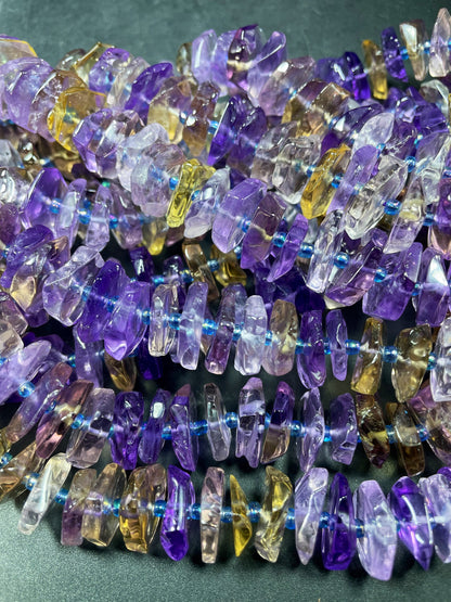 100% Natural Ametrine Gemstone Bead. Faceted 12mm Pinwheel Shape. Beautiful Natural Purple Honey Yellow Color. Super Clear Nice Quality!