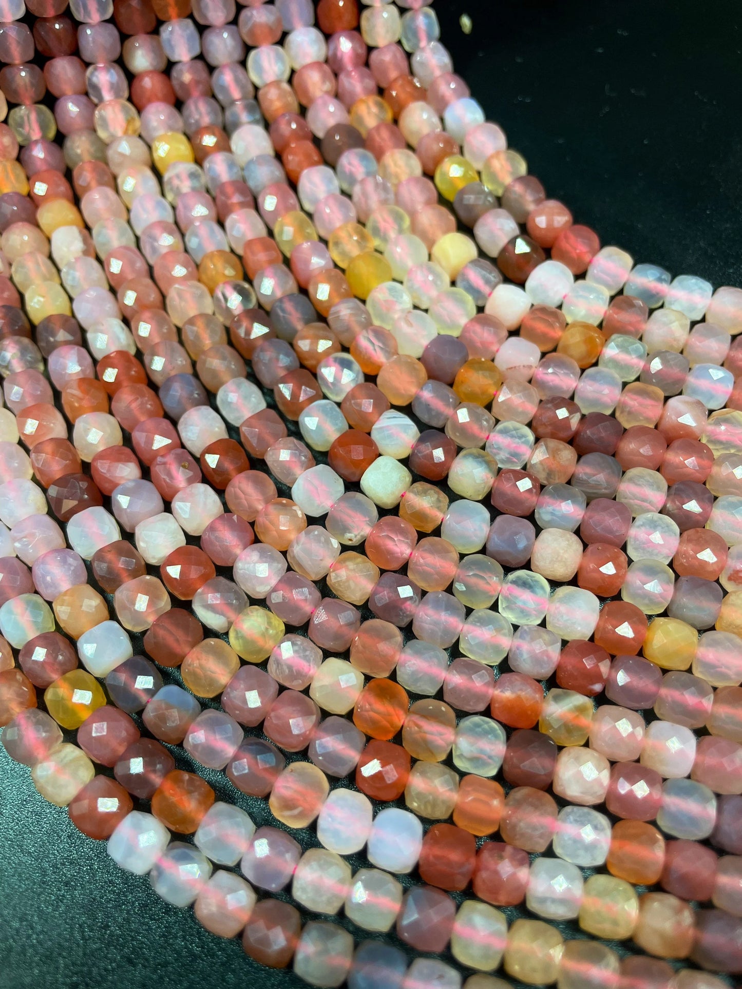 Natural red Botswana gemstone bead. Faceted 5mm cube shape bead. Gorgeous natural orange brown crammy white color. Full strand 15.5”