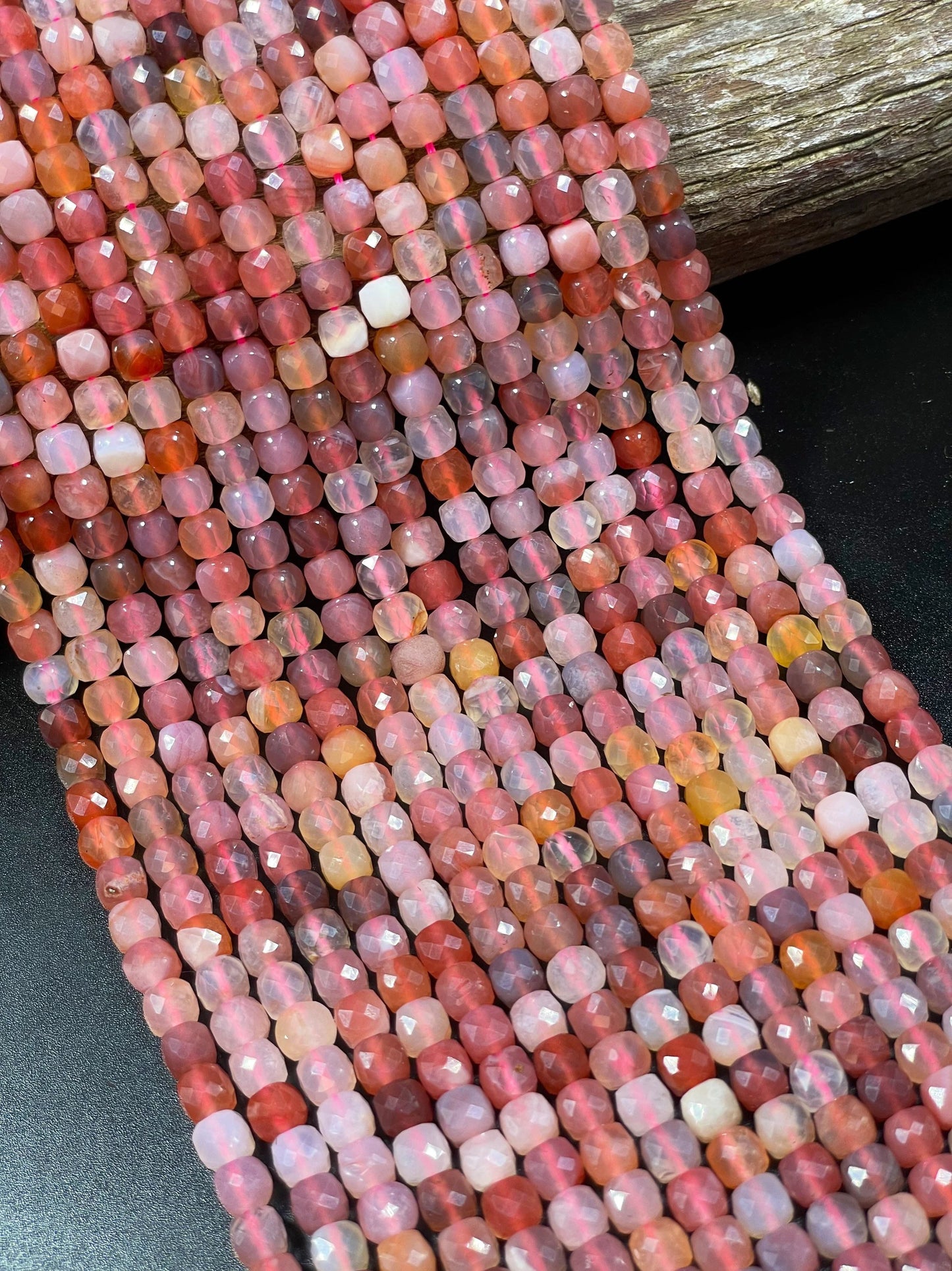Natural red Botswana gemstone bead. Faceted 5mm cube shape bead. Gorgeous natural orange brown crammy white color. Full strand 15.5”