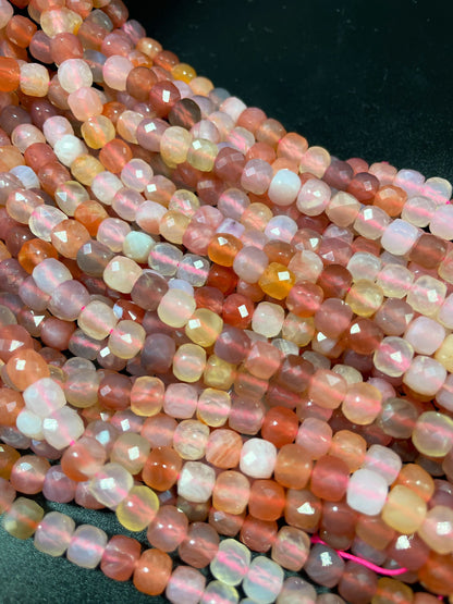 Natural red Botswana gemstone bead. Faceted 5mm cube shape bead. Gorgeous natural orange brown crammy white color. Full strand 15.5”