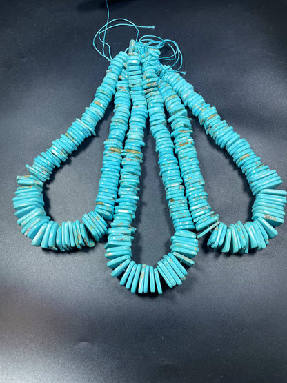 Natural blue turquoise gemstone bead . Graduated shape. Beautiful turquoise blue color. Nice polished turquoise howlite gemstone bead!