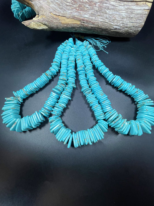 Natural blue turquoise gemstone bead . Graduated shape. Beautiful turquoise blue color. Nice polished turquoise howlite gemstone bead!
