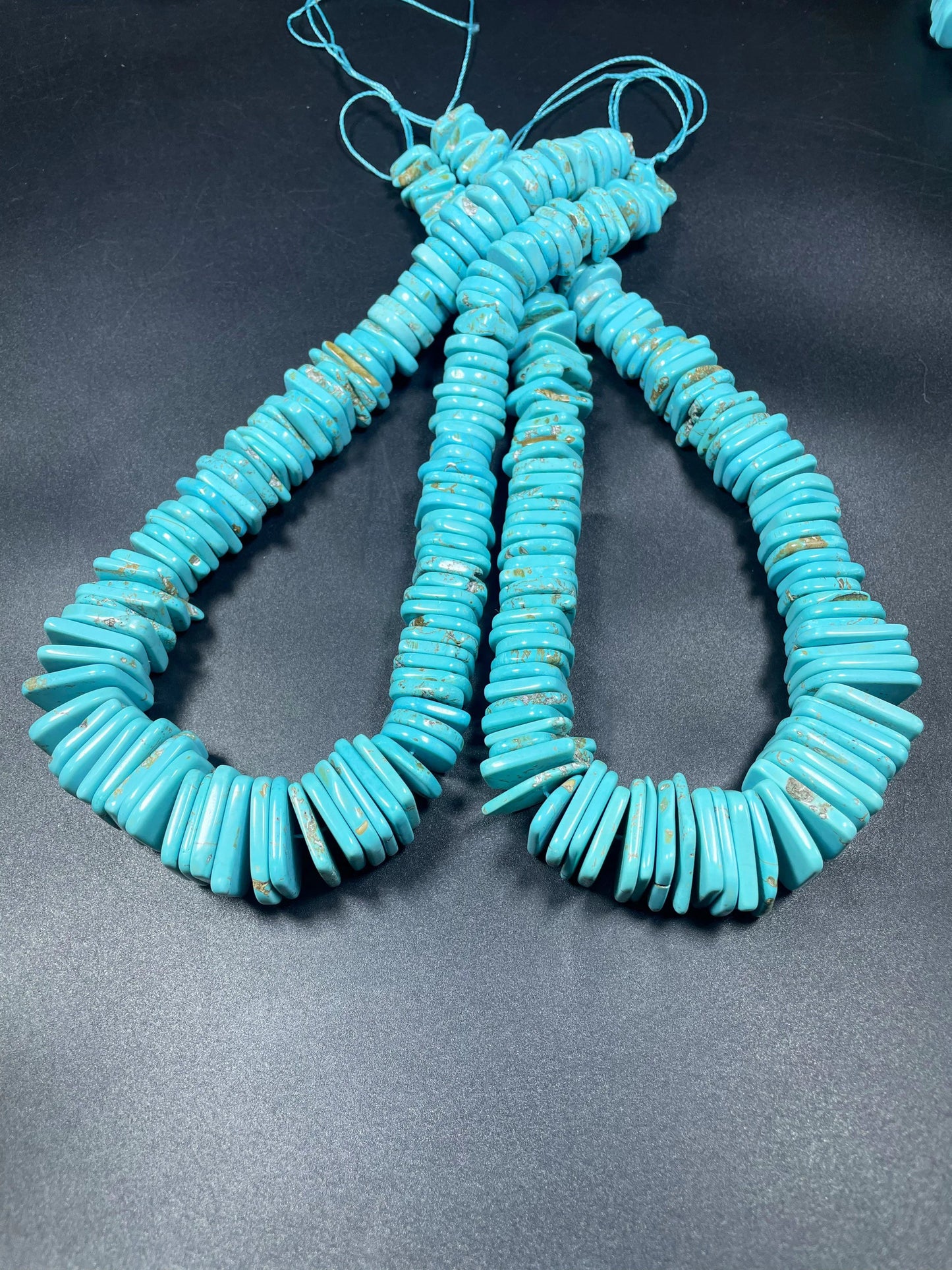 Natural blue turquoise gemstone bead . Graduated shape. Beautiful turquoise blue color. Nice polished turquoise howlite gemstone bead!