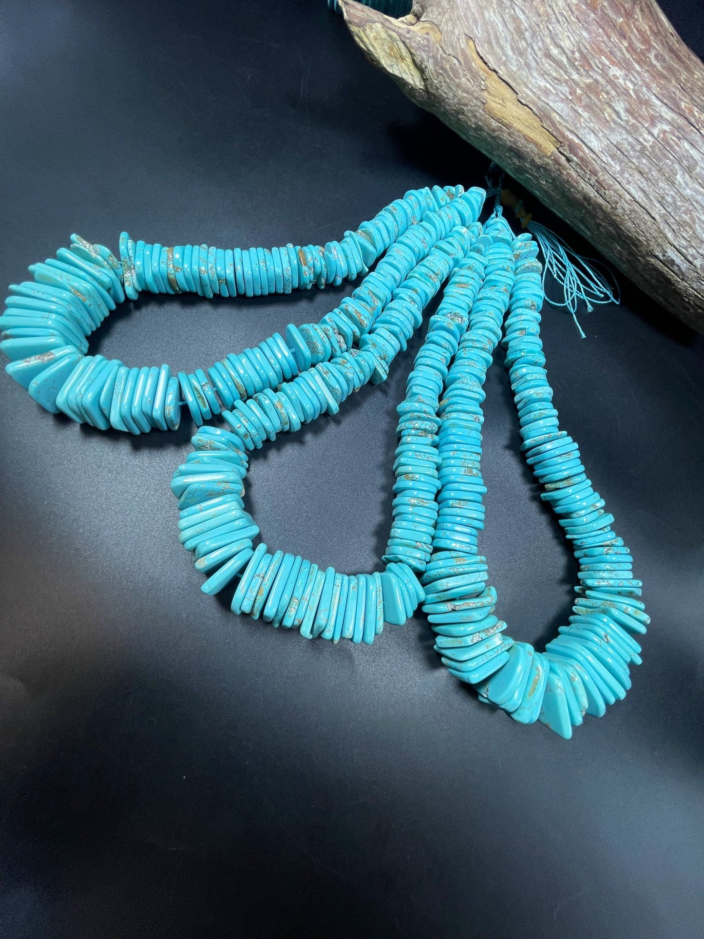 Natural blue turquoise gemstone bead . Graduated shape. Beautiful turquoise blue color. Nice polished turquoise howlite gemstone bead!
