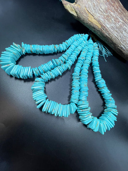 Natural blue turquoise gemstone bead . Graduated shape. Beautiful turquoise blue color. Nice polished turquoise howlite gemstone bead!
