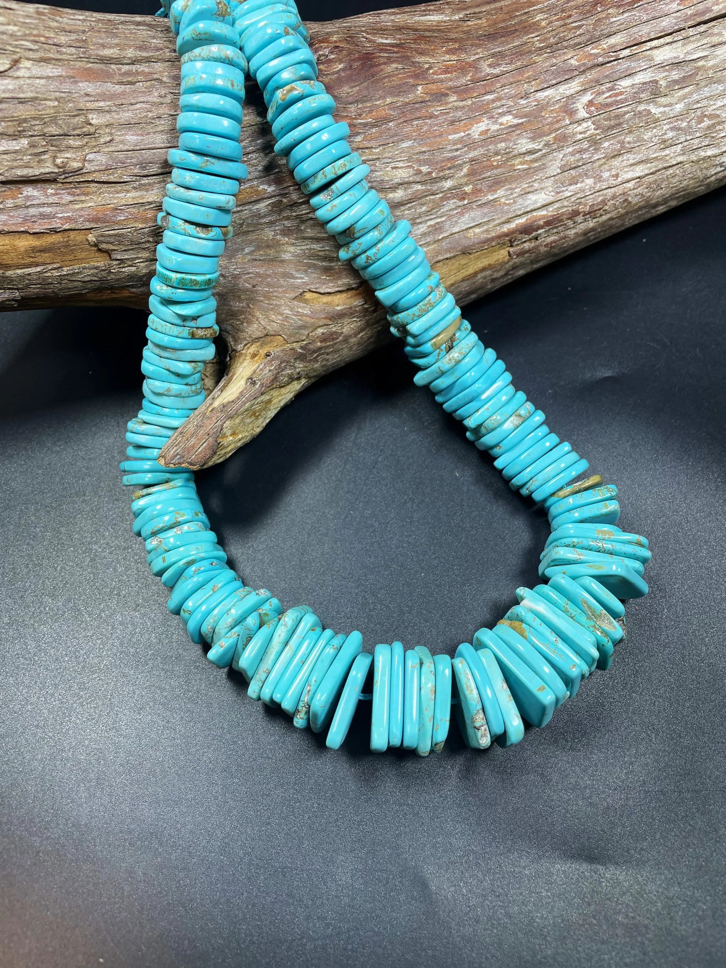 Natural blue turquoise gemstone bead . Graduated shape. Beautiful turquoise blue color. Nice polished turquoise howlite gemstone bead!