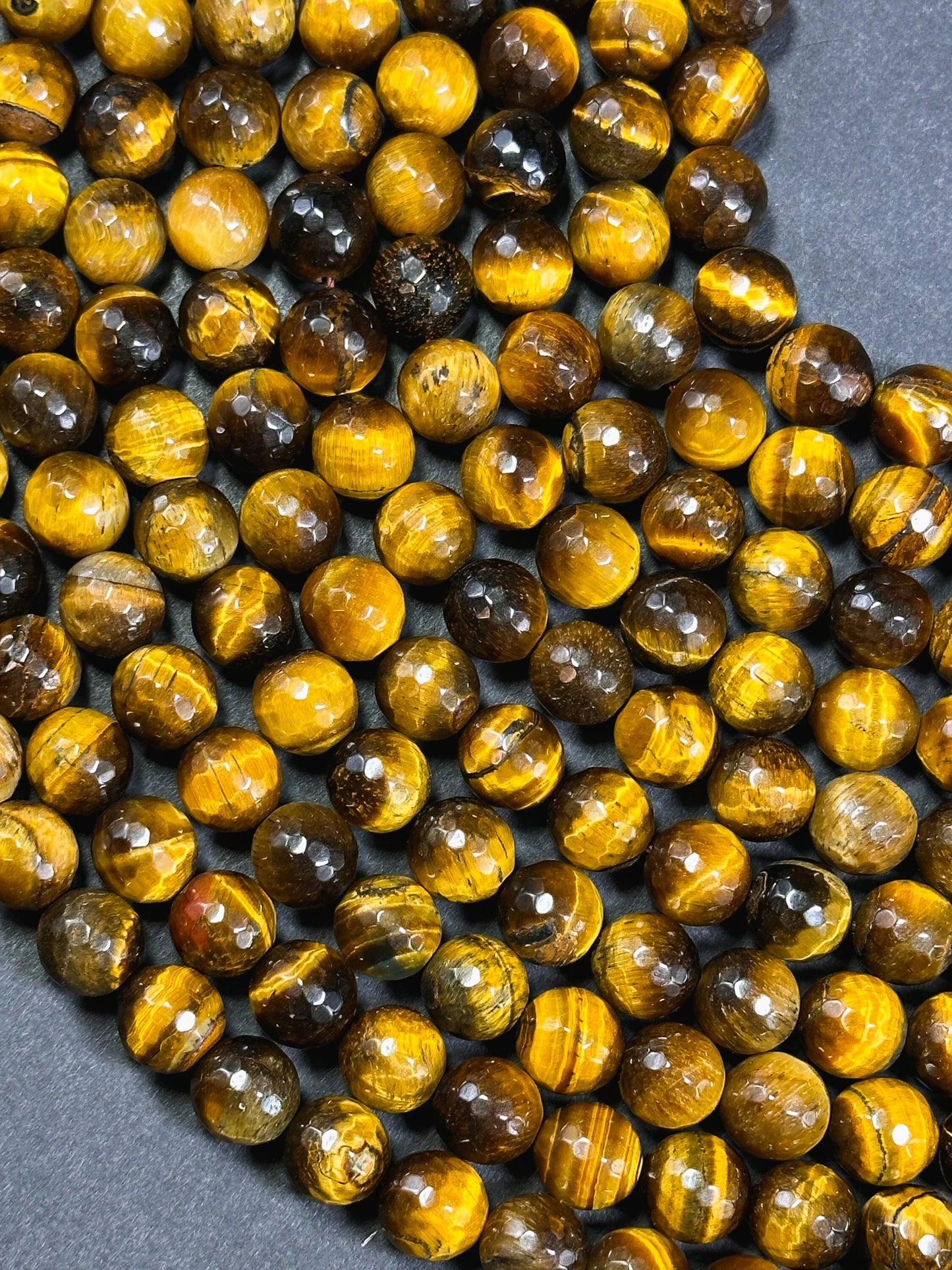AAA Natural Faceted Tiger Eye Stone Bead. 4mm-12mm round bead. Gorgeous golden brown color tiger eye. Great quality gemstone. 15.5”