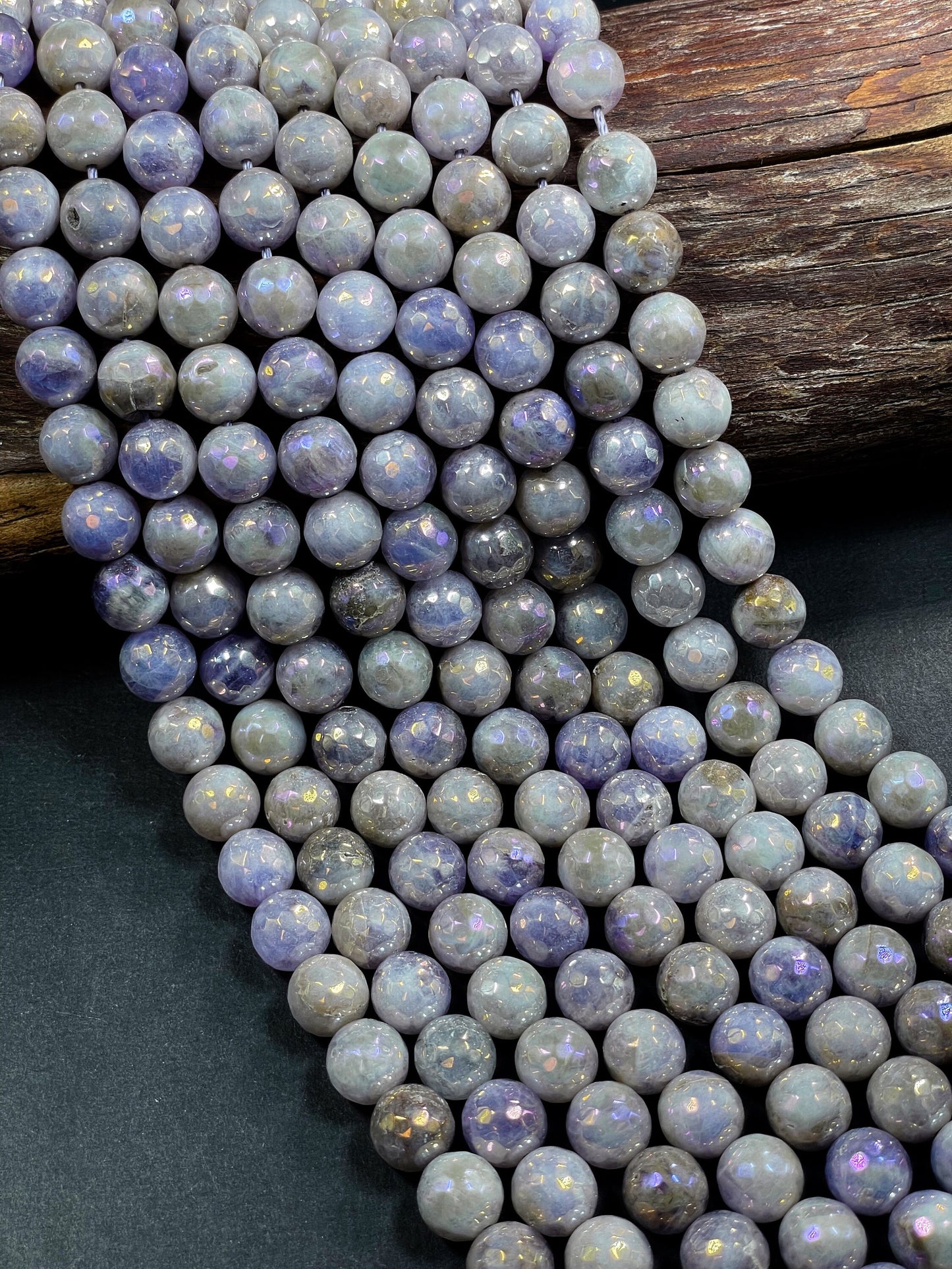AAA Natural mystic lavender jade . Faceted round gemstone bead.  Gorgeous purple color. Excellent quality. Full strand 15.5"