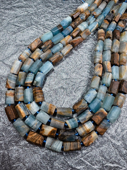 AA Natural blue calcite gemstone bead. 8x12mm tube shape . unique matte finished . excellent quality gemstone bead . full strand 15.5”