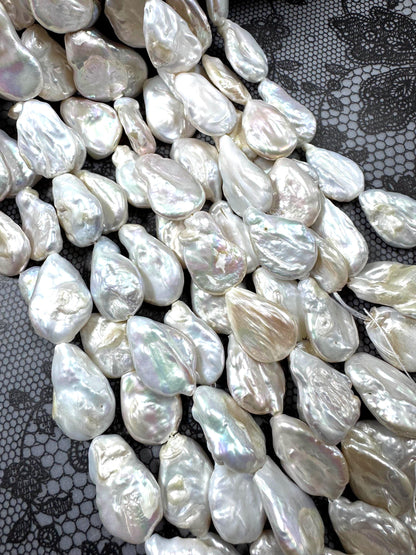 Natural fresh water pearls bead. teardrop shape . beautiful Natural white color pearls beads . nice quality . full strand .