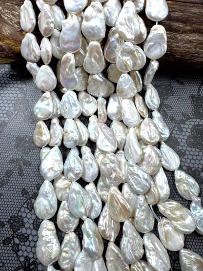 Natural fresh water pearls bead. teardrop shape . beautiful Natural white color pearls beads . nice quality . full strand .