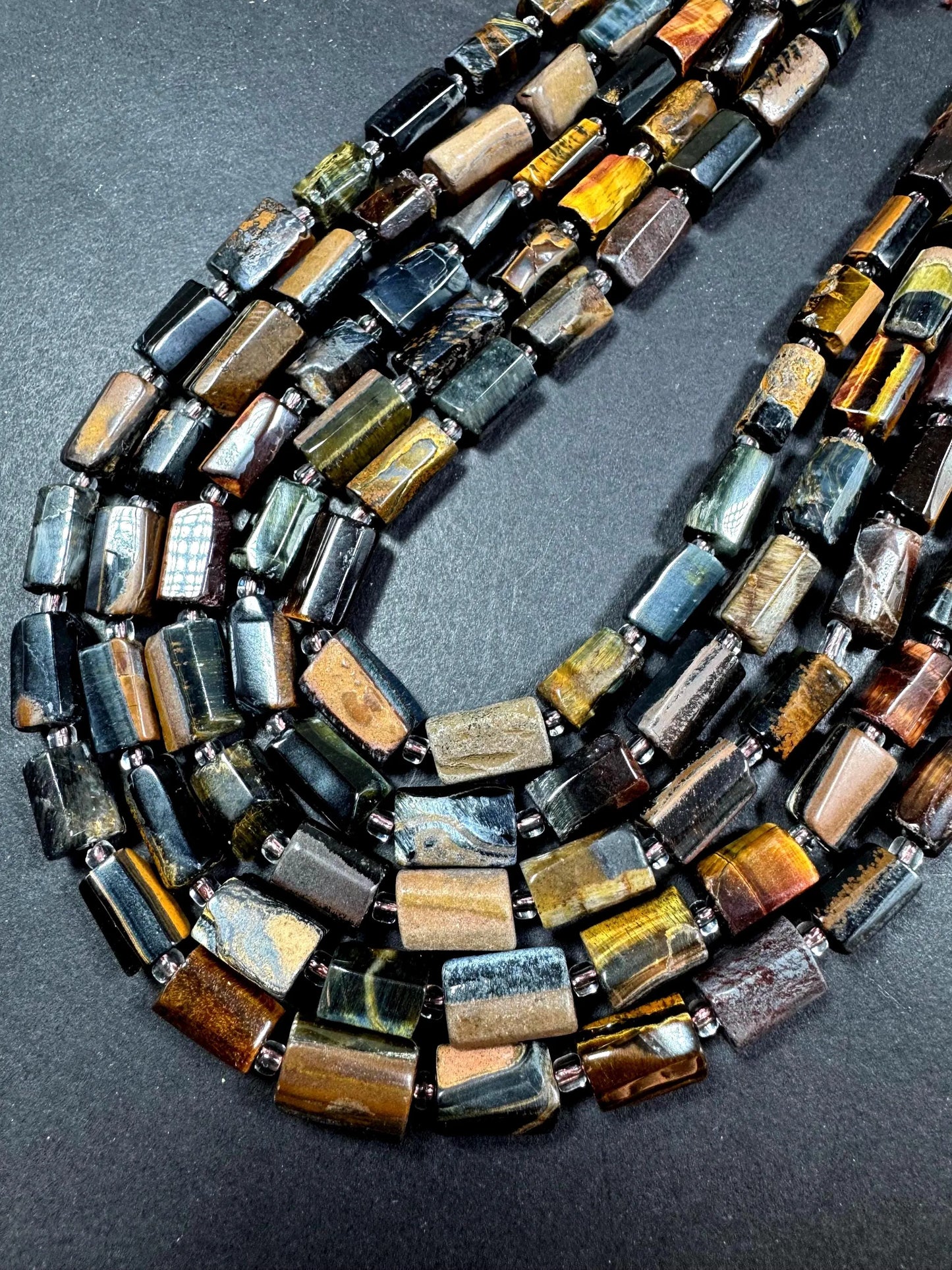 AAA Natural multi tiger eye gemstone bead. 8x12mm tube shape .beautiful Natural color. Excellent quality .  full strand 1