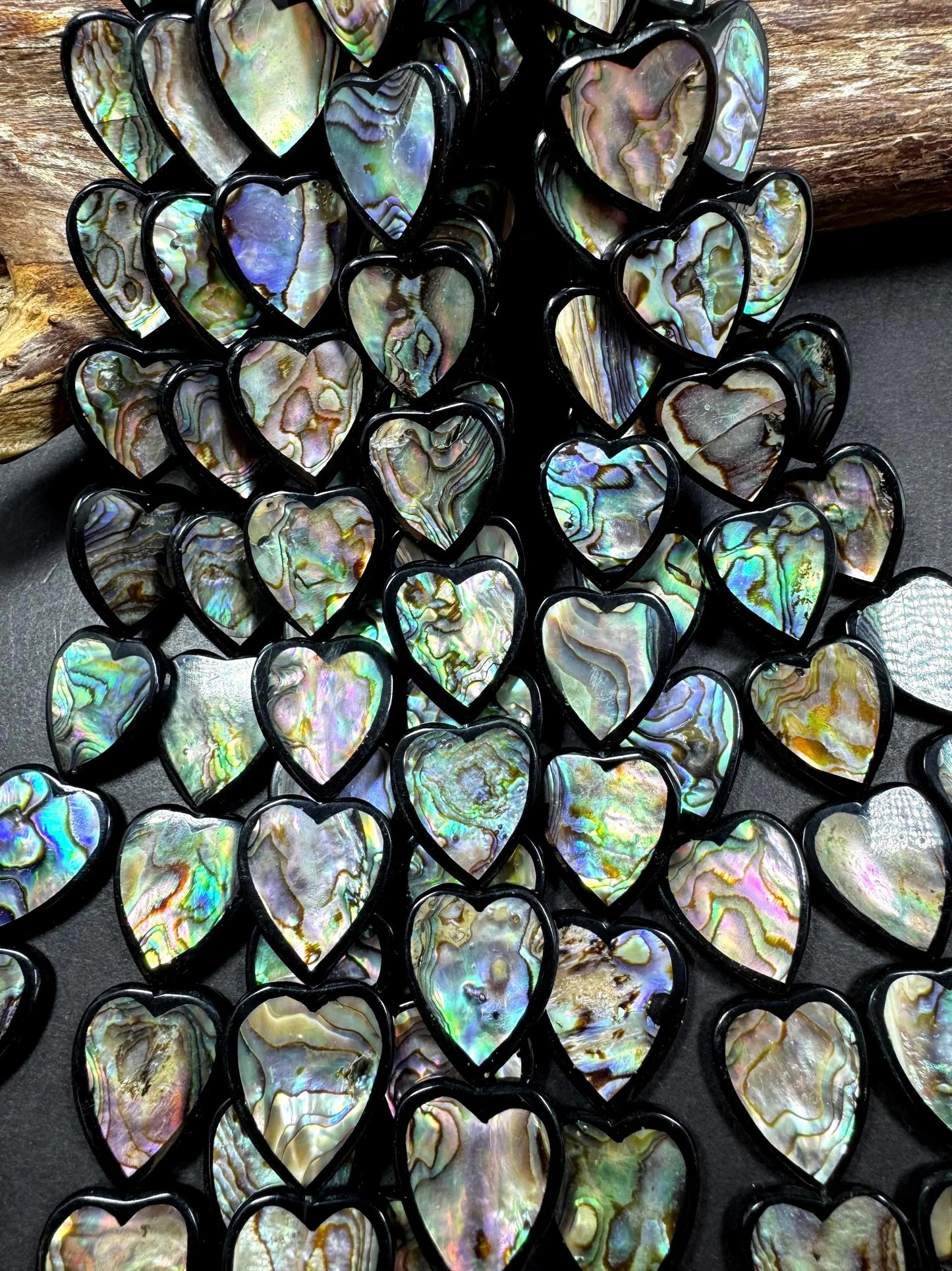 Natural abalone shell beads . Beautiful heart shape 20mm  gorgeous natural color . excellent quality . abalone beads