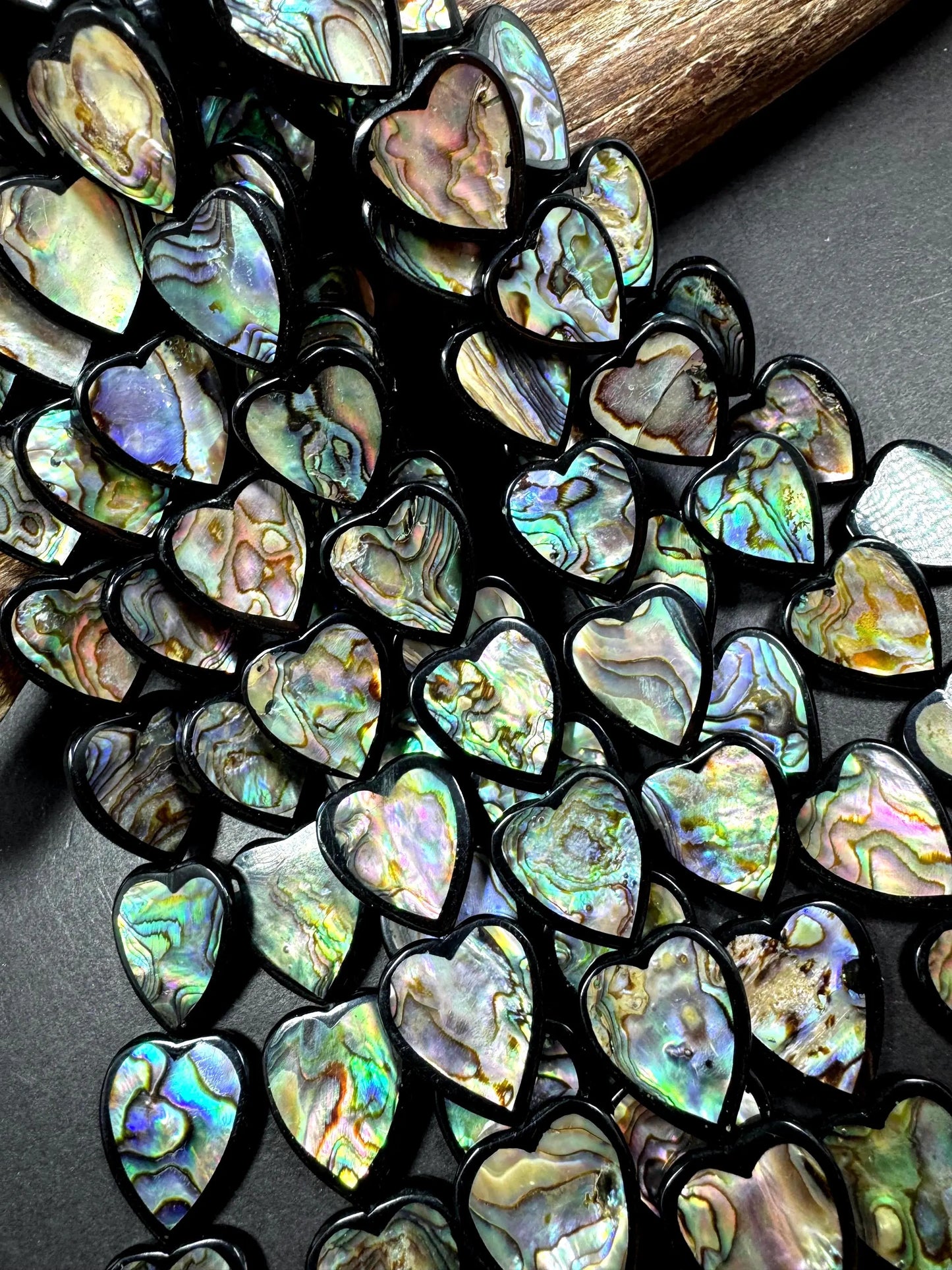 Natural abalone shell beads . Beautiful heart shape 20mm  gorgeous natural color . excellent quality . abalone beads