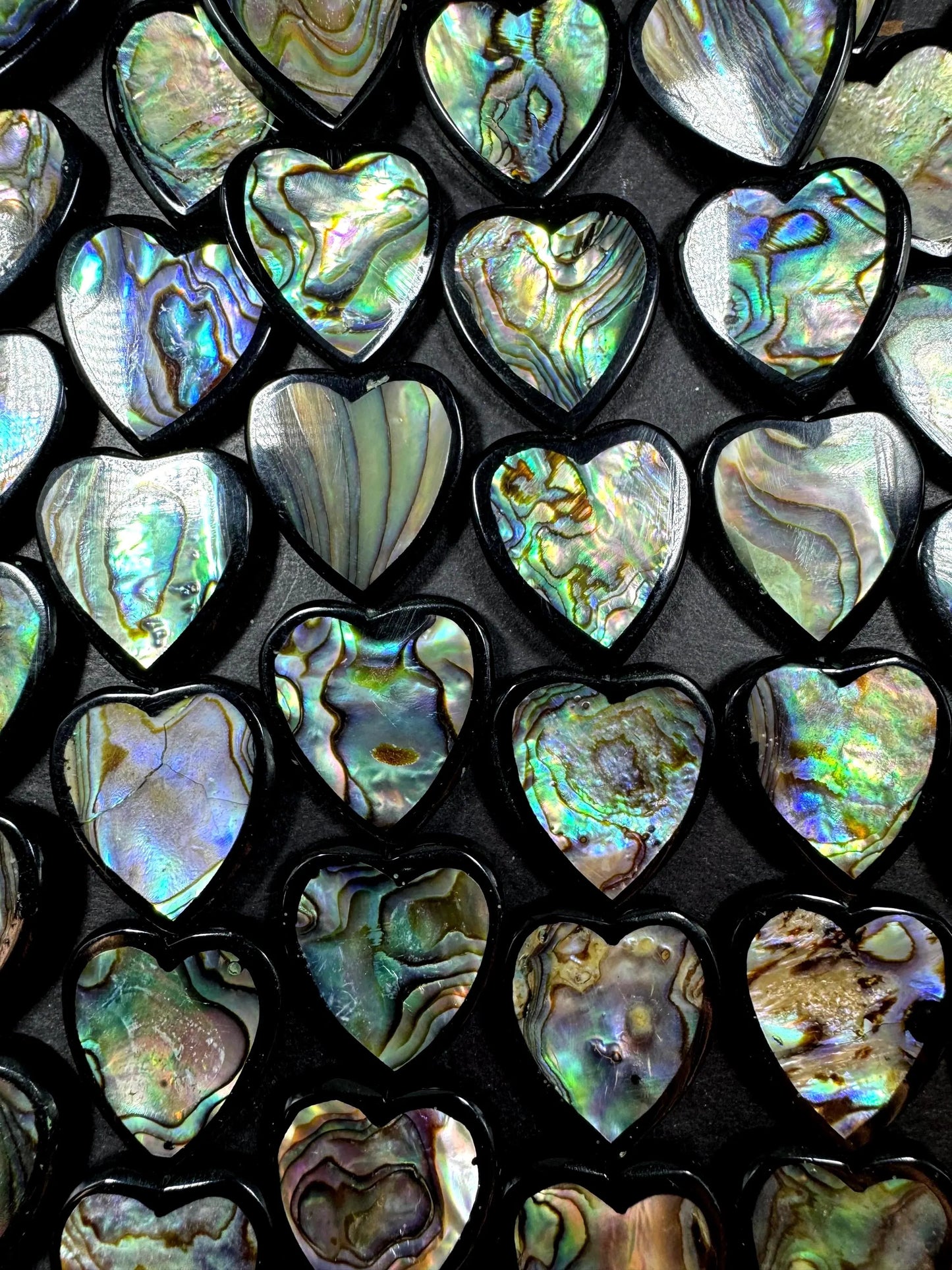 Natural abalone shell beads . Beautiful heart shape 20mm  gorgeous natural color . excellent quality . abalone beads